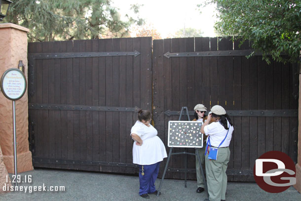 Several cast members were out with a pin board in front of the gate.