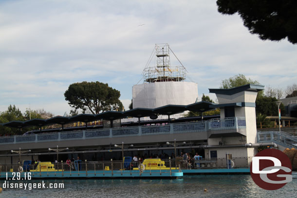 The main building has scaffolding and tarps up around it.