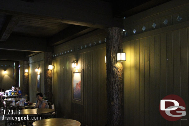 The posters continue on the lower level of the Hungry Bear wall and are near the lights for the area.  