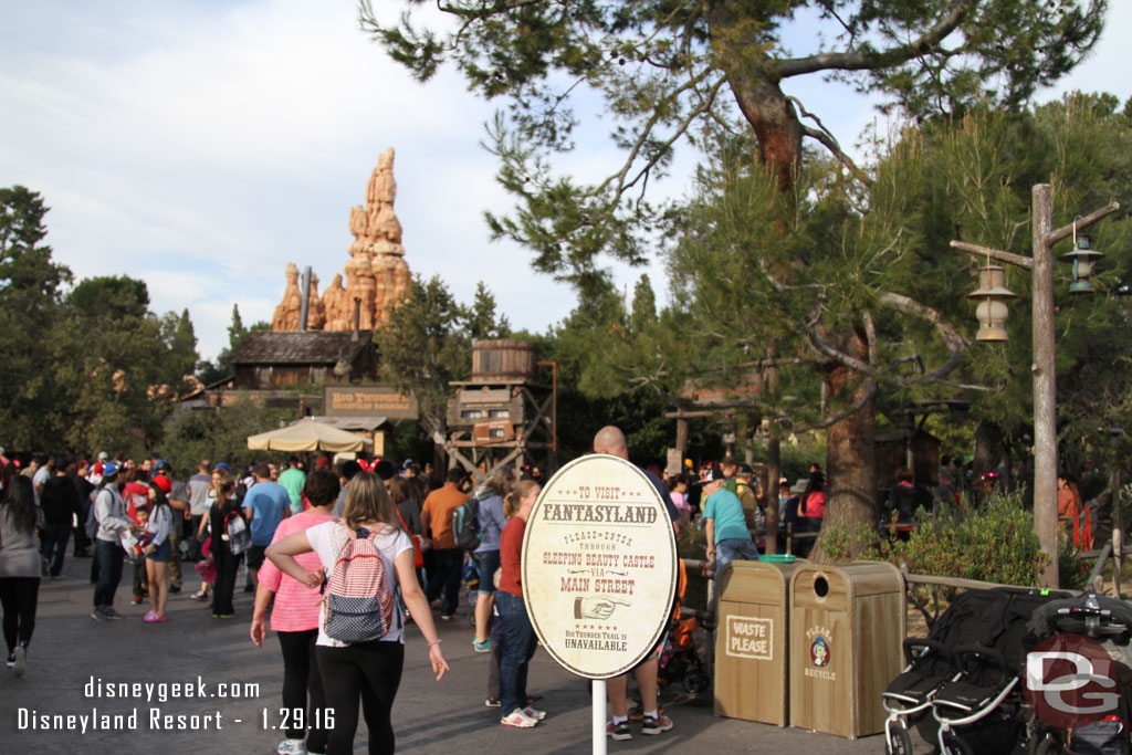 A sign to warn you of the dead end ahead and how to find your way to Fantasyland.