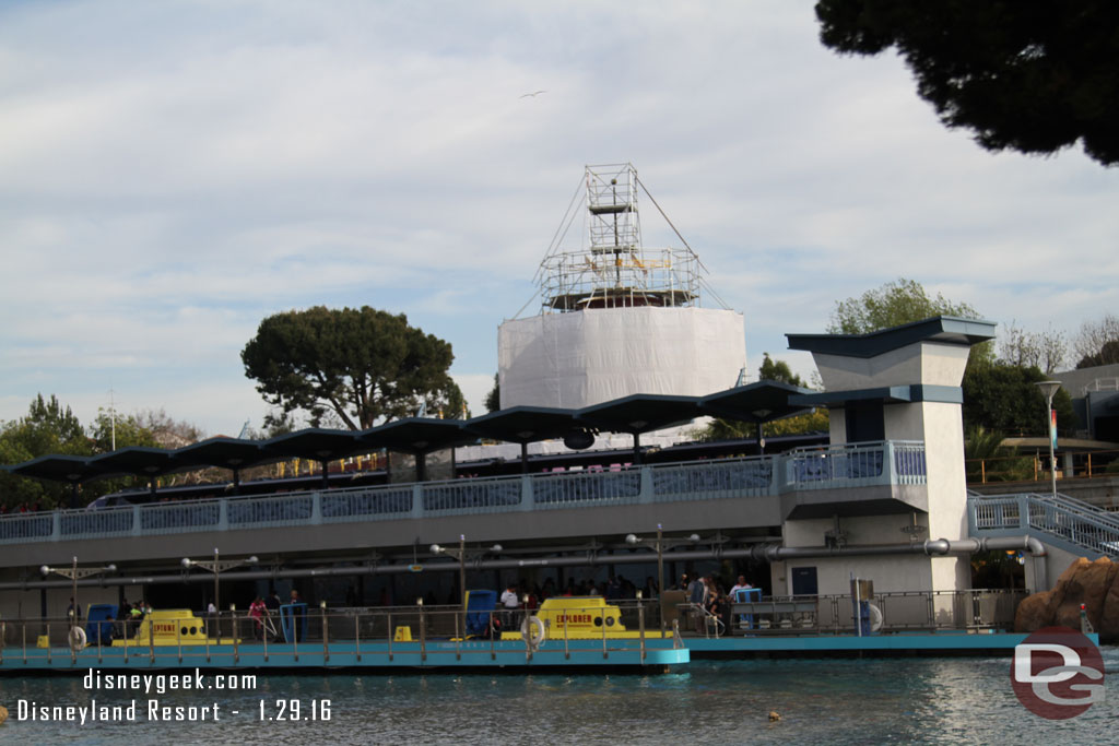 The main building has scaffolding and tarps up around it.