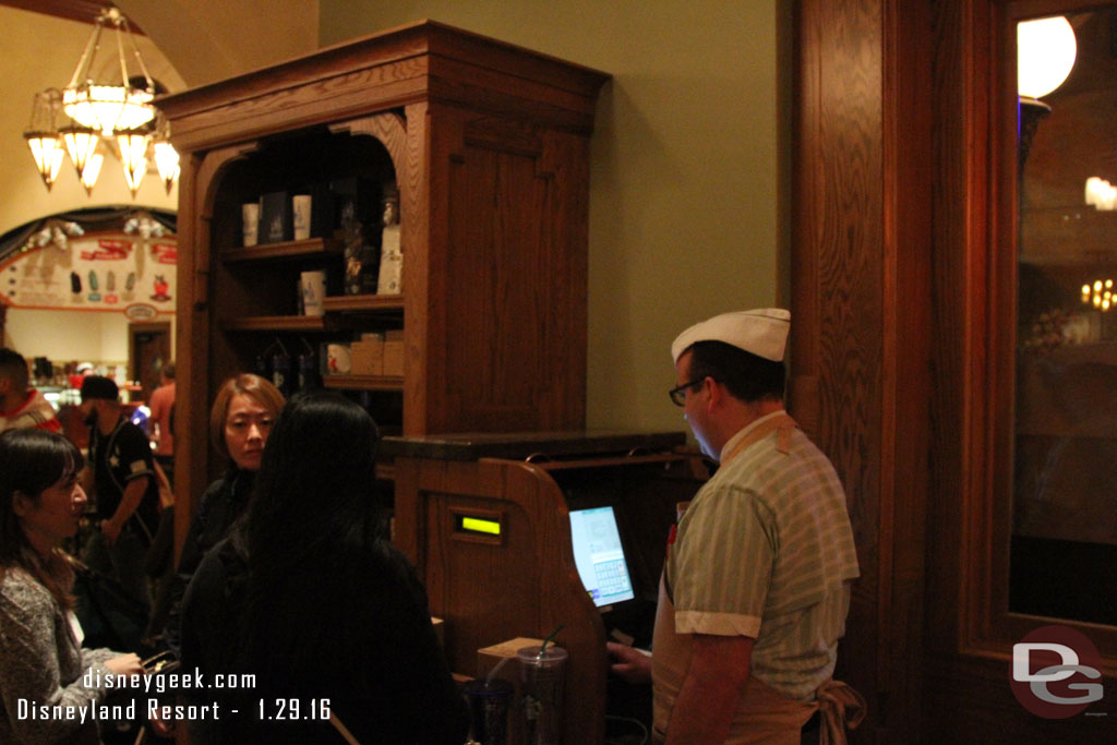 A display and cash register has been added to the cafe to sell Starbucks merchandise.