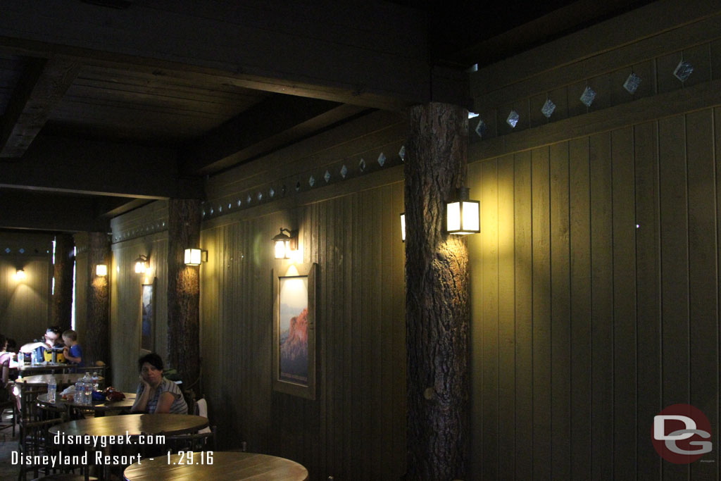 The posters continue on the lower level of the Hungry Bear wall and are near the lights for the area.  