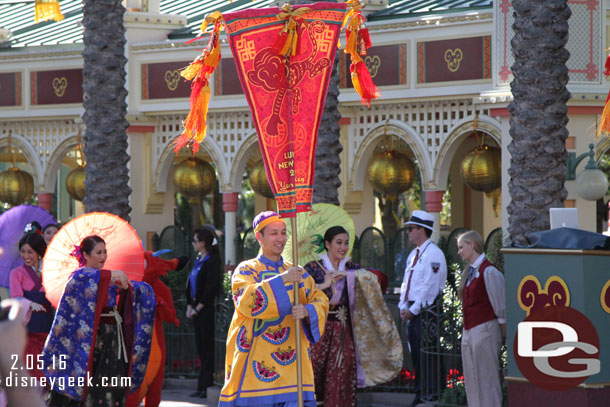 The Happy Lunar New Year Processional occurs four times a day and features several performers and Mulan & Mushu.