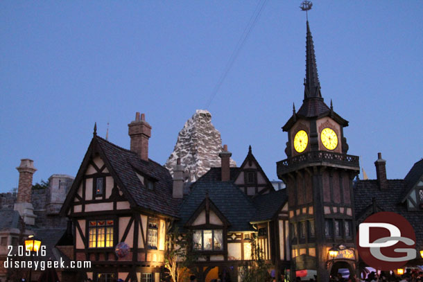 Walking through Fantasyland as the sun set.