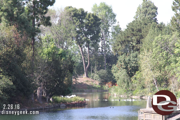 Up River you can see the start of the cofferdam.  The white bags spanning the river base Splash Mountain.