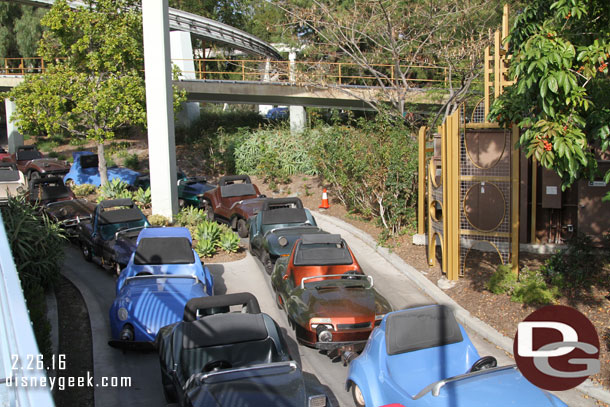 Autopia cars parked throughout the track while the queue and work areas are being renovated.