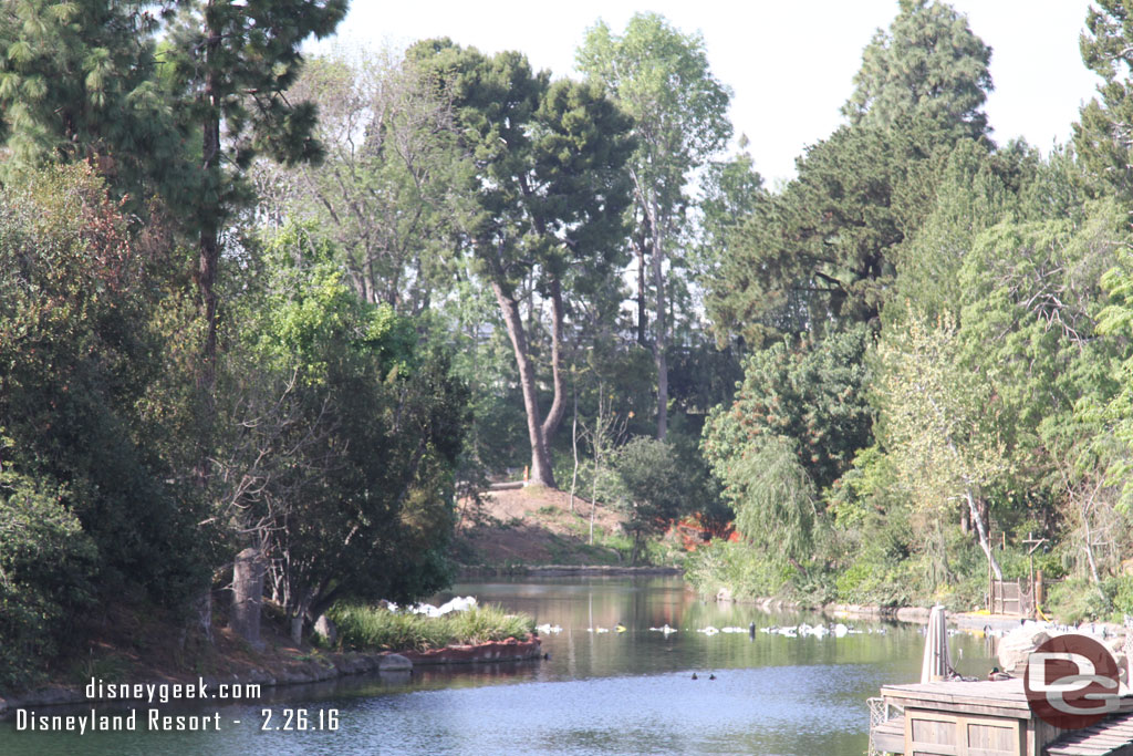 Up River you can see the start of the cofferdam.  The white bags spanning the river base Splash Mountain.