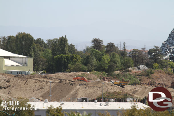 The berm is clear and dirt is being moved around.