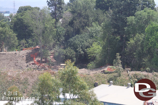 The cabin and tree are no longer on the riverbank.  Assuming they have been moved somewhere waiting for their new home.