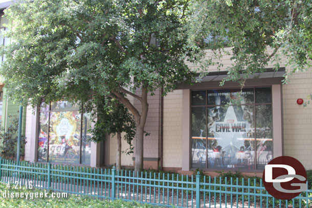 Heading to the park.  Captain America and Alice movie windows at the tram stop.