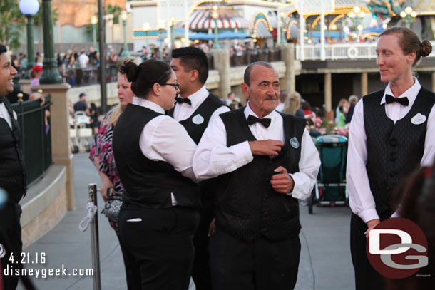 Cast Members preparing to escort us to the party are.  The checkin process was extremely slow.  They started at 7:30 sharp and we were about the middle of the line and we did not get seated until 7:52.  World of Color started at 8:15 so approximately half the party time was waiting to be checked in.