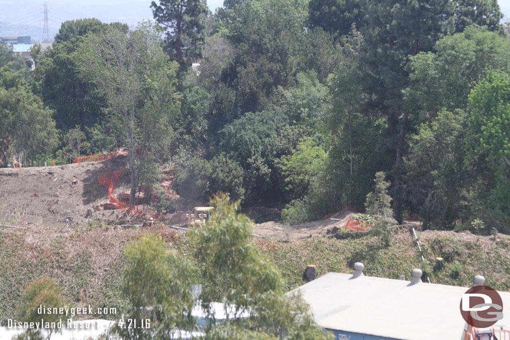 The cabin and tree are no longer on the riverbank.  Assuming they have been moved somewhere waiting for their new home.