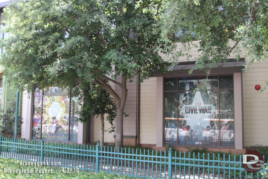 Heading to the park.  Captain America and Alice movie windows at the tram stop.