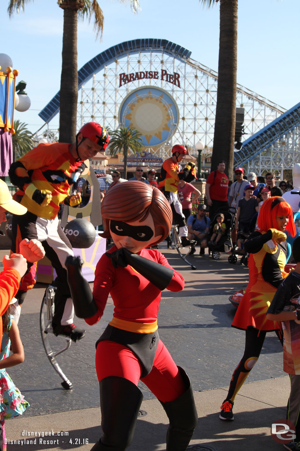 Mrs. Incredible warming up/stretching with the recruits.