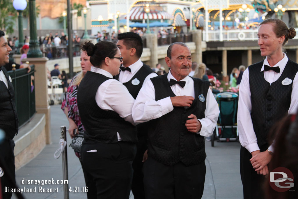 Cast Members preparing to escort us to the party are.  The checkin process was extremely slow.  They started at 7:30 sharp and we were about the middle of the line and we did not get seated until 7:52.  World of Color started at 8:15 so approximately half the party time was waiting to be checked in.