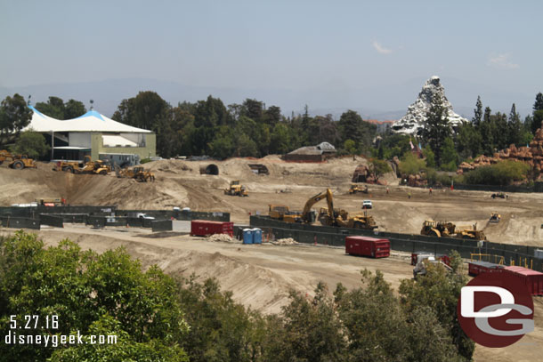 In the foreground looks like a hole is being dug on the left.  With the trees you really could not see.