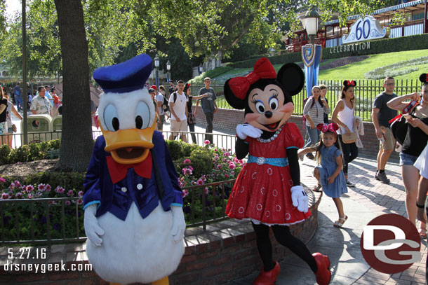 Donald and Minnie were greeting guests.