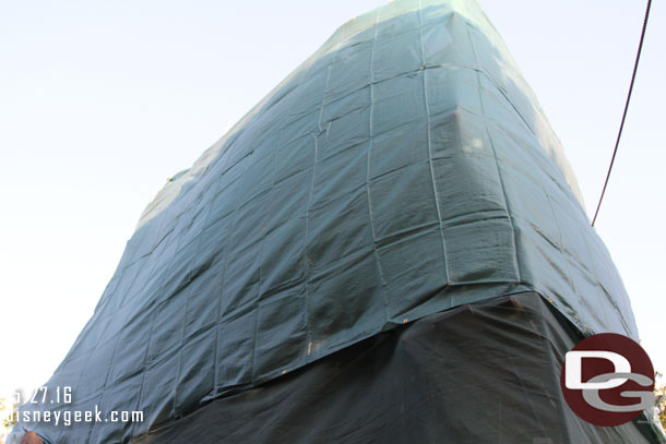 The front portion of the treehouse is under wraps.