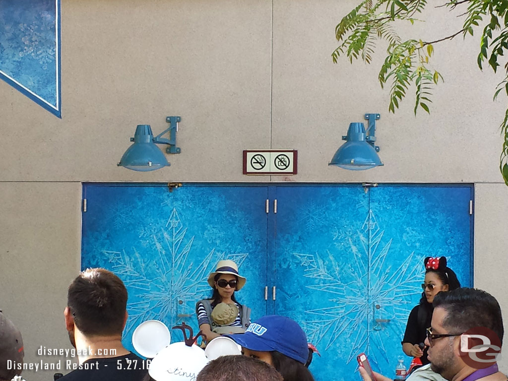 Eventually made it in the queue for the balcony (it was 2:41).  The doors for the orchestra level have a Frozen overlay on them.