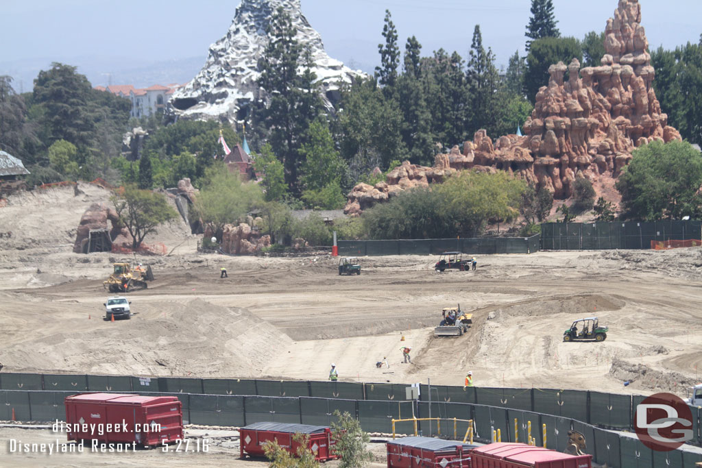 What appears to be a path with dirt built up on both sides is taking shape in the middle of the site.  Maybe it is one of the entrances where the train will pass overhead.