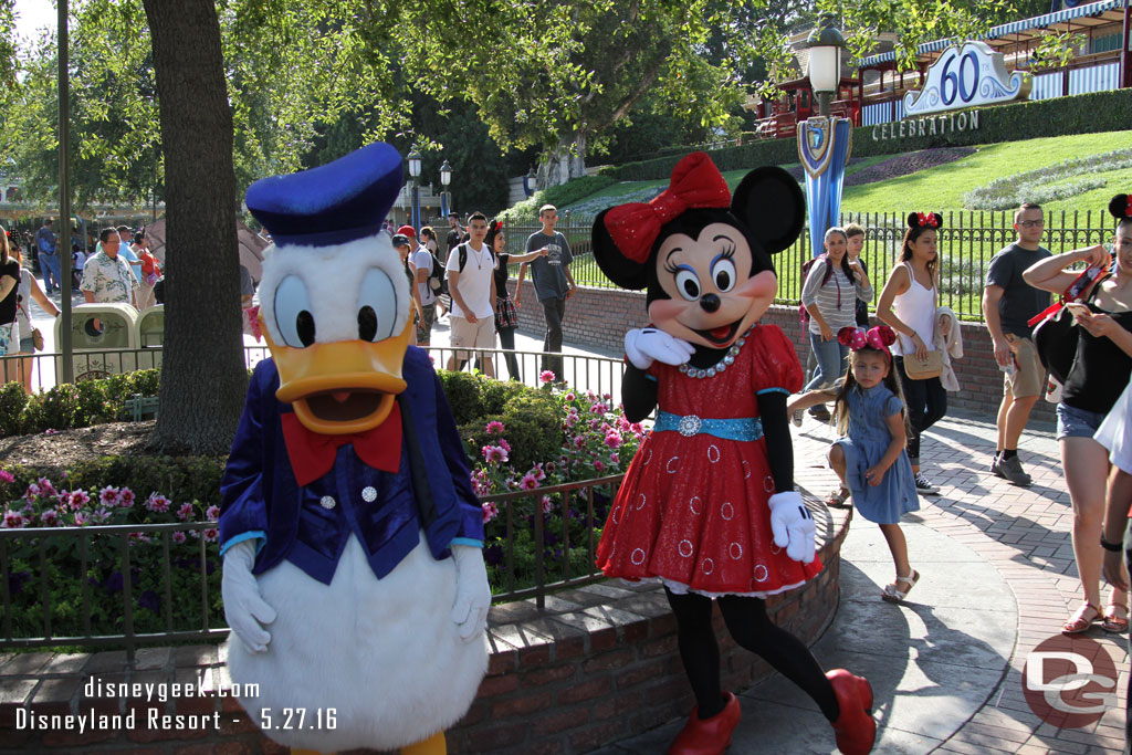 Donald and Minnie were greeting guests.