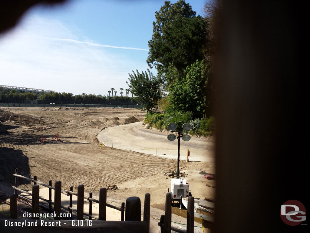 Through the fence you can see what appears to be the curve of the river taking shape.