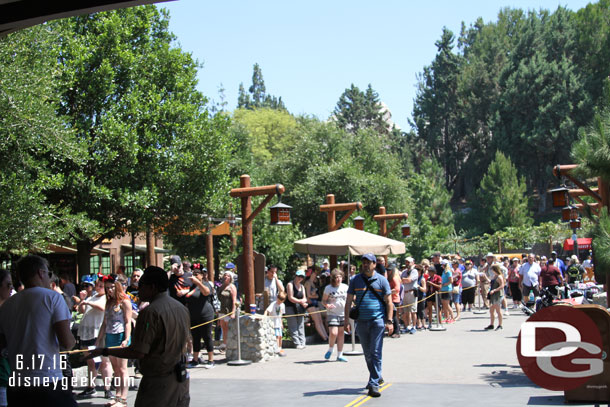 The FastPass return line stretched out toward the entrance of Smoke Jumpers (it turned the corner and I could not see the end).