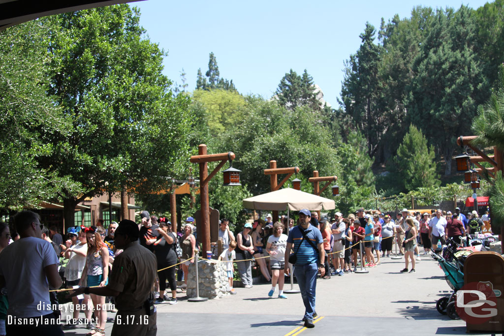 The FastPass return line stretched out toward the entrance of Smoke Jumpers (it turned the corner and I could not see the end).