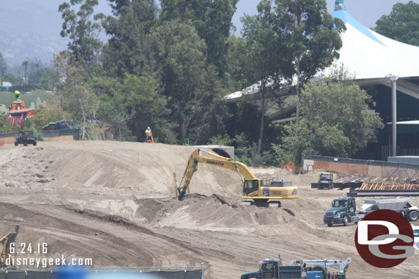 Noticed one survey person on the far mound of dirt.  Also you can see what looks to be part of an old tunnel off to the right of the mound.