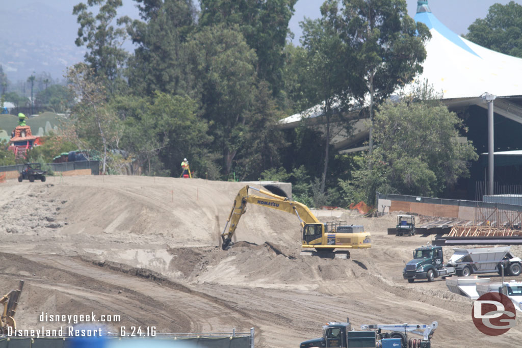 Noticed one survey person on the far mound of dirt.  Also you can see what looks to be part of an old tunnel off to the right of the mound.