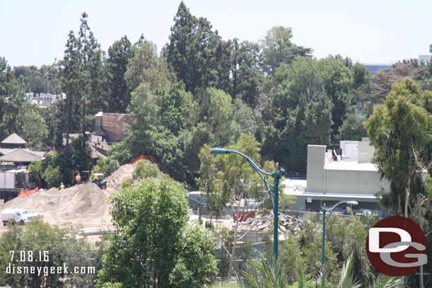 Off to the far right of the site more asphalt waiting to be hauled away.