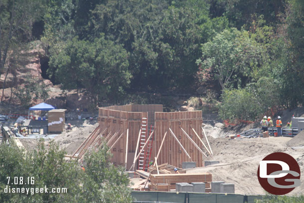 A small structure taking shape.  Guessing it is one of the two utility buildings that there are permits for.