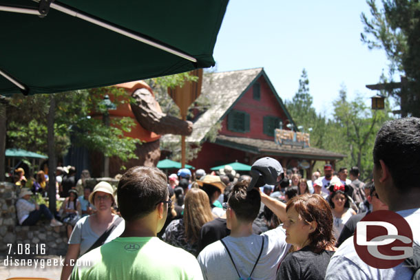 Hmm.. this is the back of the line for World of Color Fastpasses for the second show.  Seems to be a popular ticket this afternoon... or maybe these guests think they are in line for Grizzly River Run.