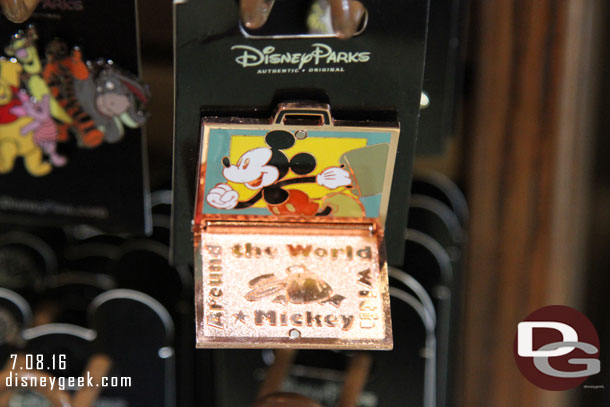 Inside it has Mickey and the text Around the World with Mickey.