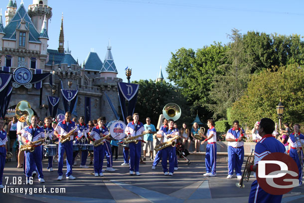 The All-American College Band performing in front of the Castle, led this set by their TA.