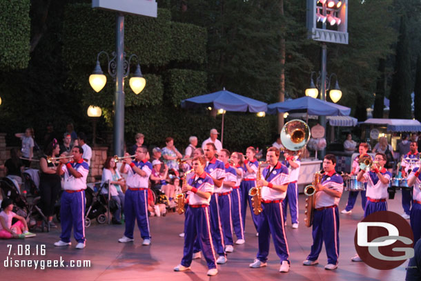 The All-American College Band kicking off their pre-parade near Small World.