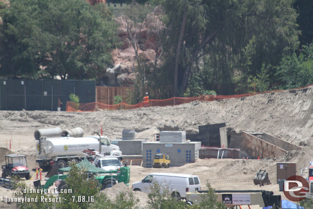 Temporary retaining walls as more pipes and conduits are laid.