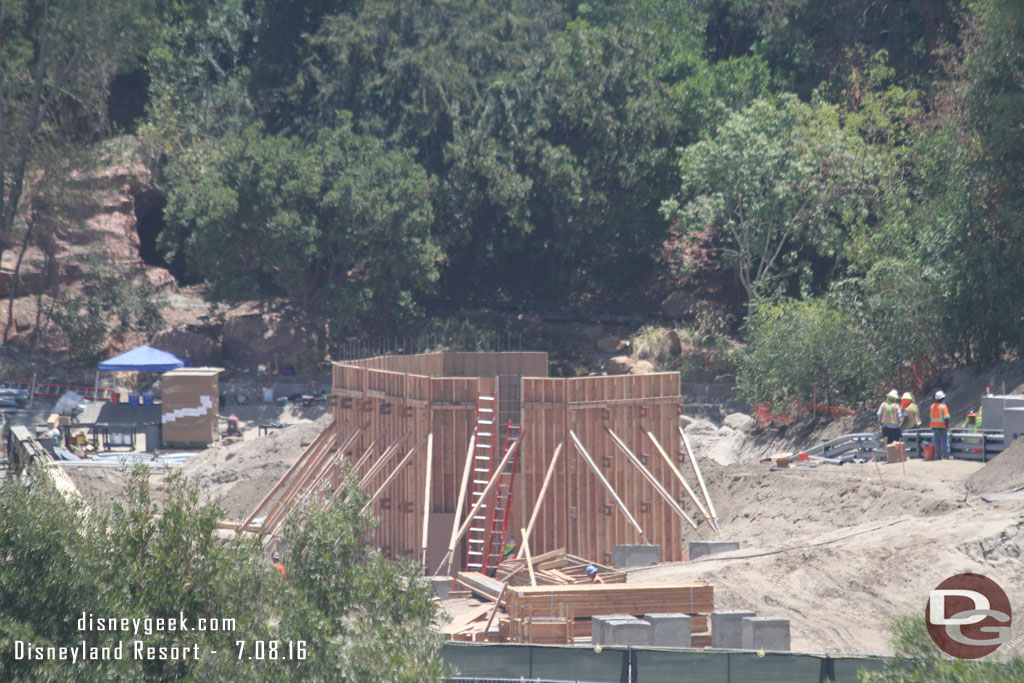 A small structure taking shape.  Guessing it is one of the two utility buildings that there are permits for.