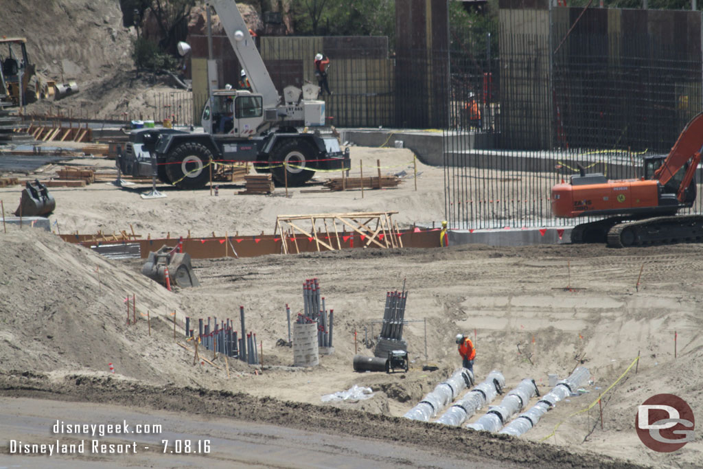 A lot of conduit and piping is run to this area near the center of the site. 