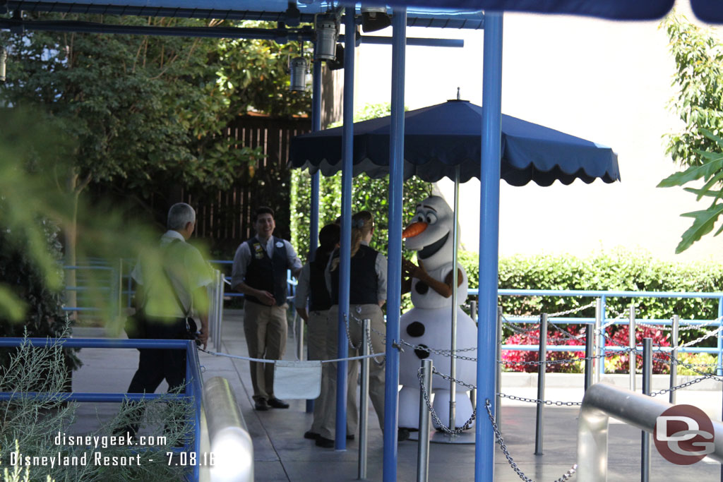 Olaf was outside meeting guests.