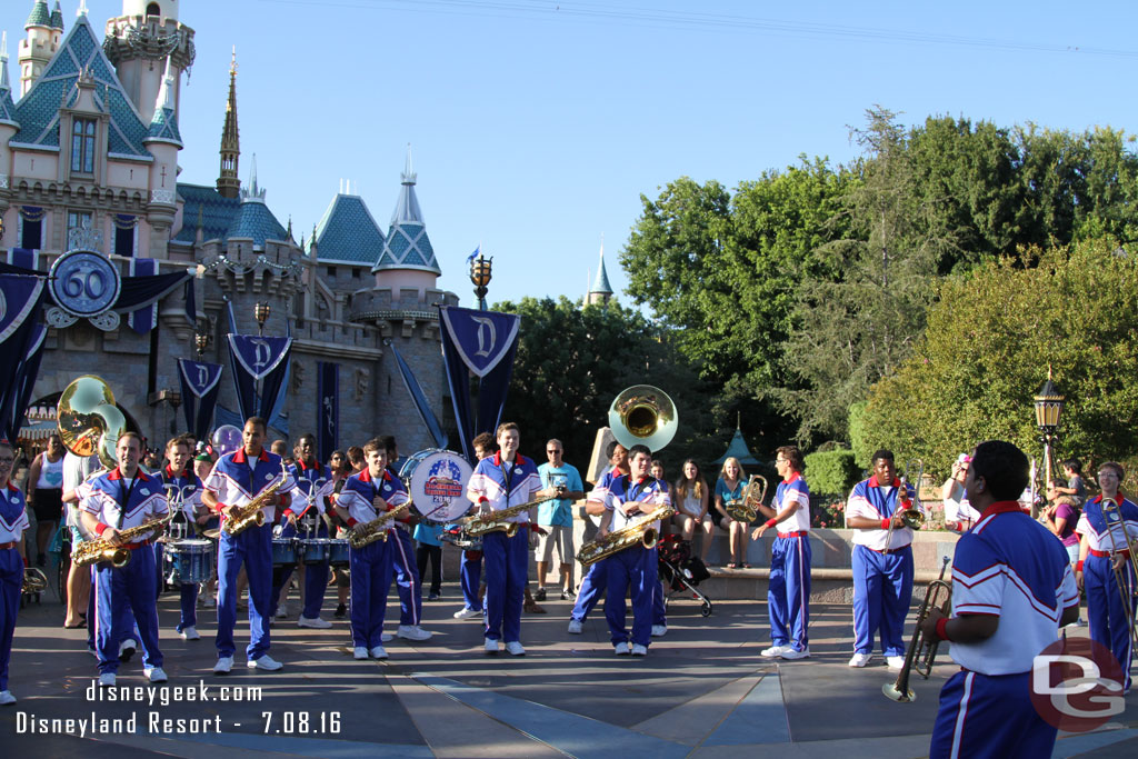 The All-American College Band performing in front of the Castle, led this set by their TA.