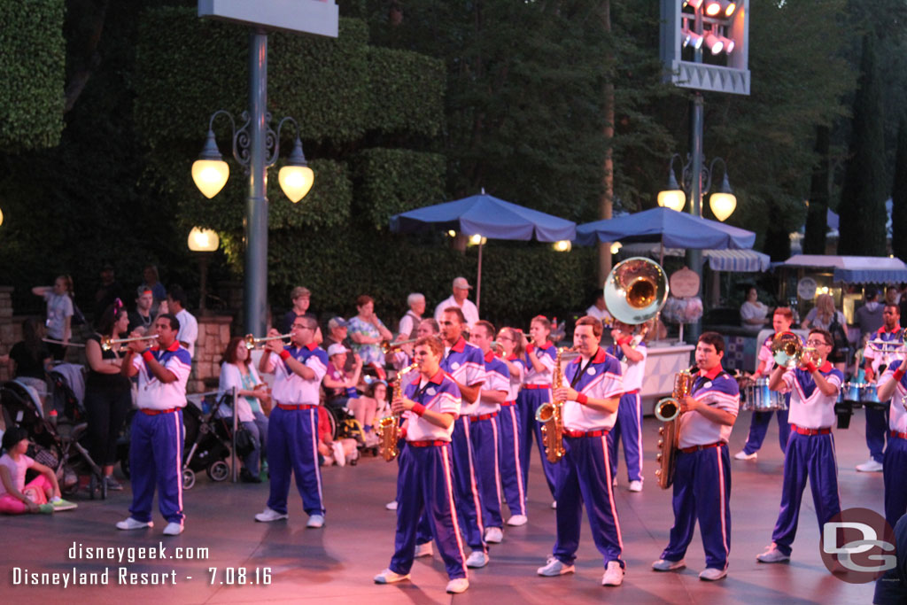 The All-American College Band kicking off their pre-parade near Small World.