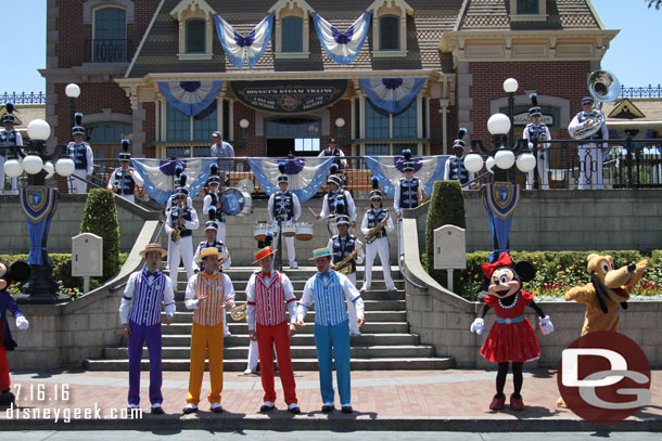 The Dapper Dans joined the march and when they reached down square they led a sing along of Live the Magic.