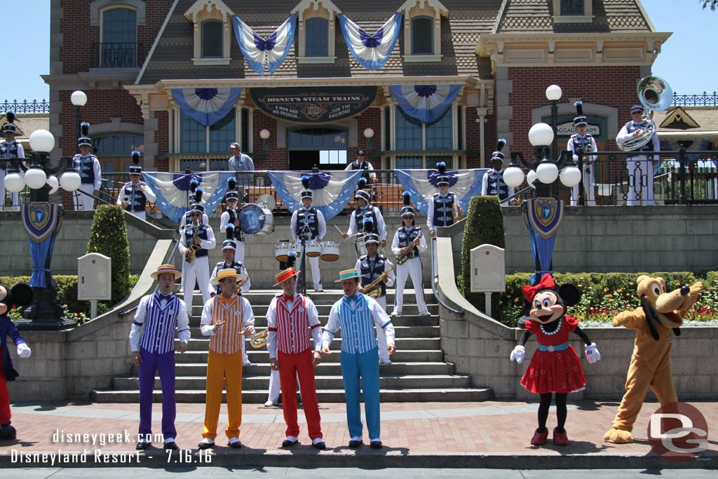 The Dapper Dans joined the march and when they reached down square they led a sing along of Live the Magic.