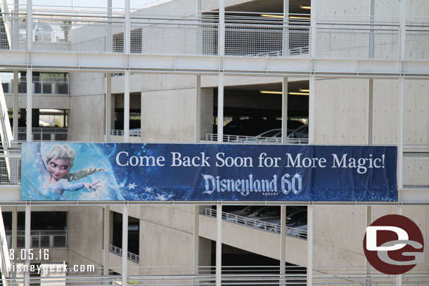 The Frozen Disneyland 60 exit banner at the Mickey and Friends Parking Structure.