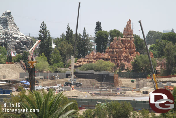 The footers are done for the next section of wall and the rebar is growing.  Also in the background notice the dirt level rising along the Big Thunder Trail wall.