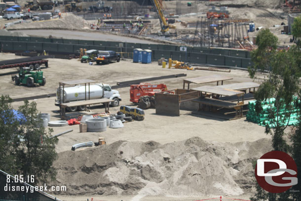 In the near area dirt and equipment as work continues on the utility installation under the new perimeter road.