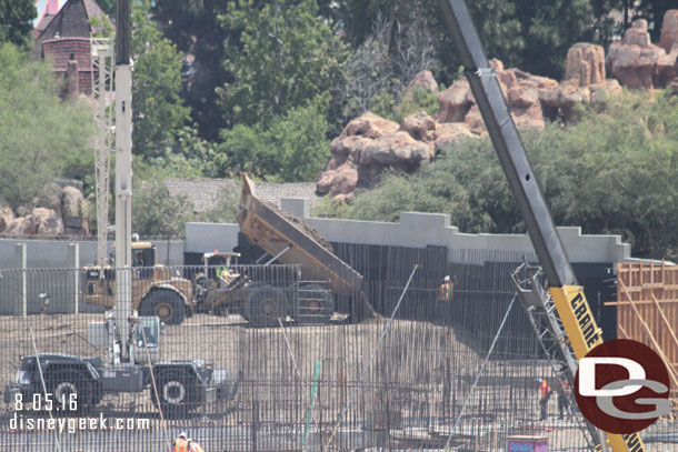 Here you can see them bringing in more dirt behind the wall along the Big Thunder Trail.