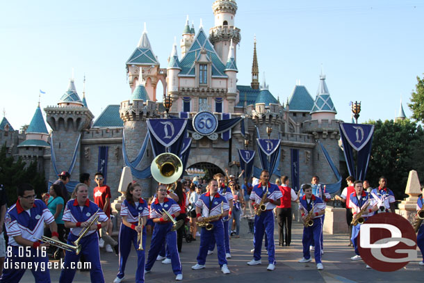 The All American College Band in front of Sleeping Beauty Castle.